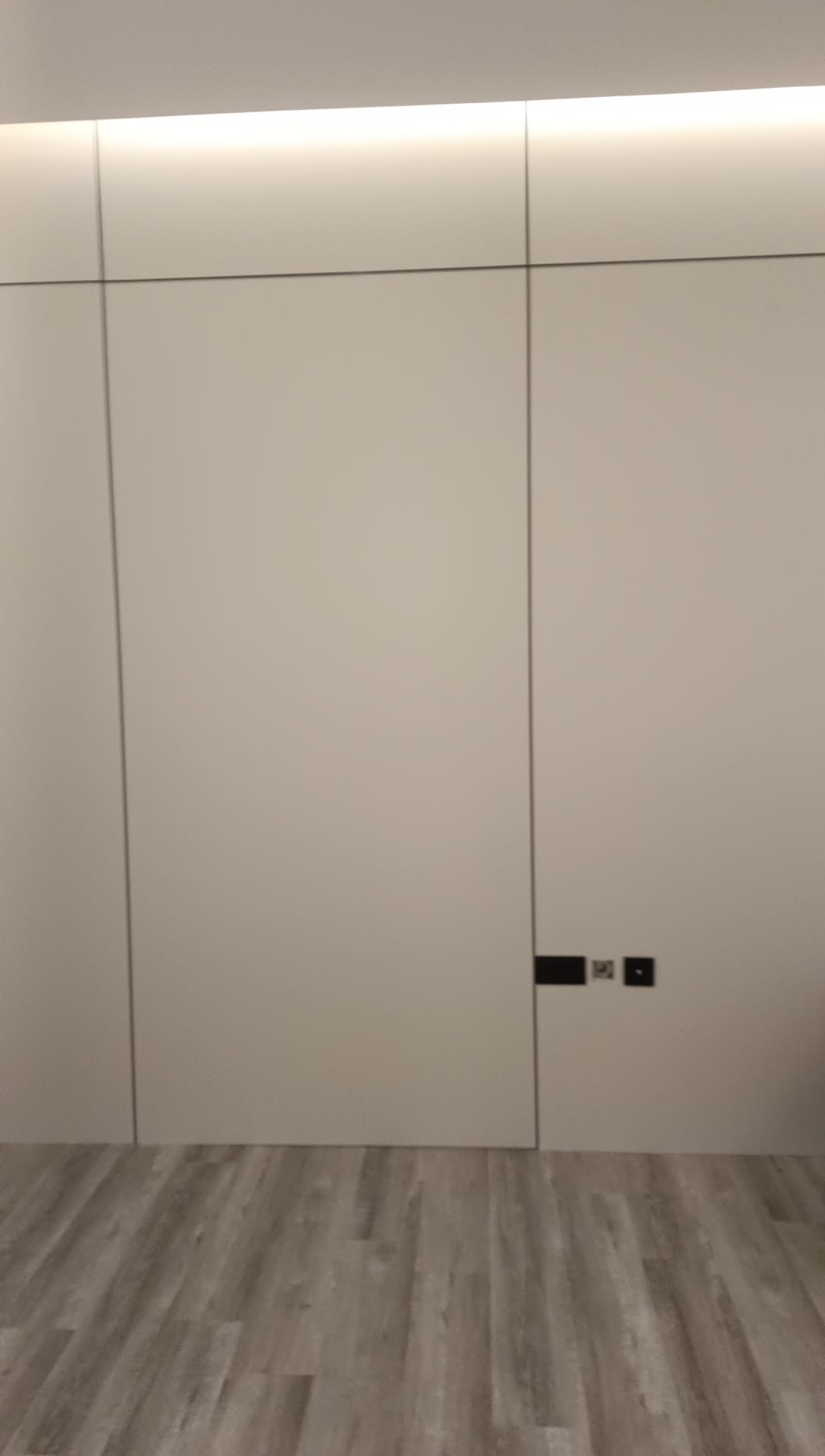 Built-in cabinetry integrated with gypsum wall detailing in a Doha interior (view 2)